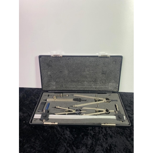 240 - A cased drawing instrument set