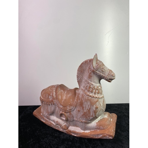 309 - Oriental pottery rocking horse