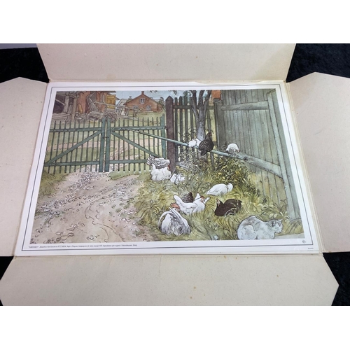 340 - Folio comtaining nine Carl Larsson prints