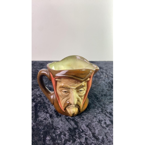 523 - Royal Doulton character jug entitled Mephistopheles D5758 with verse on the underside. Issued betwee... 