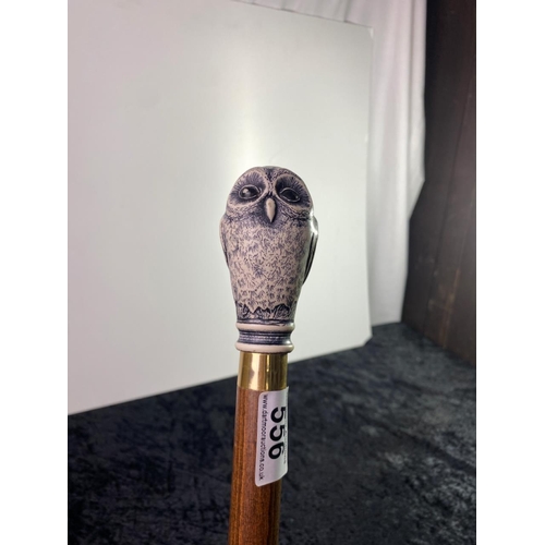 556 - Wooden walking stick with resin owl handle