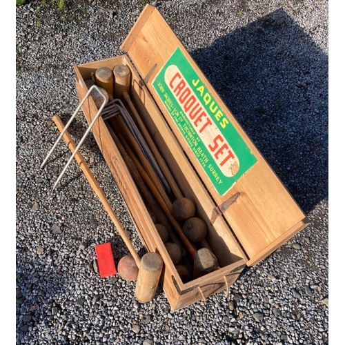 73 - A Jaques of London wooden vintage croquet set in original wooden chest. H27cm L110cm D25cm.