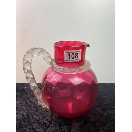 108 - Victorian/Bohemian Cranberry glass jug, after 1870 with glass rope handle coiled round body