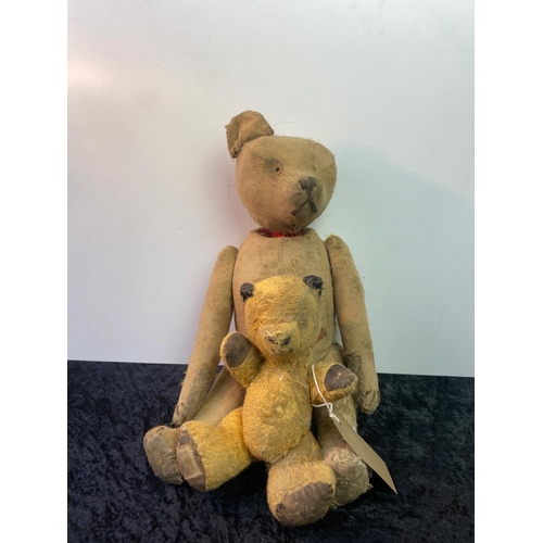 117 - Two vintage/antique teddy bears, one straw filled, no fur, one ear, humped back and stitched nose wi... 