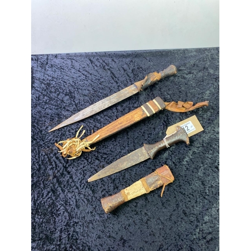 12 - Pair of ethnic daggers / knives with leather sheaths