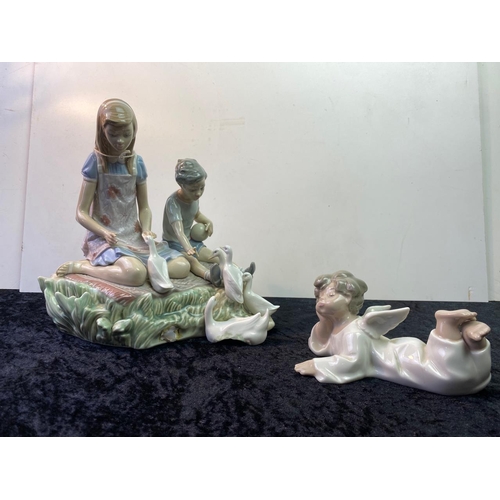 144 - Lladro - *4541 Boy Angel/Putto Lying Down by Fulgencio Garcia; Lladro *5303 Playing Ducks at Pond (o... 