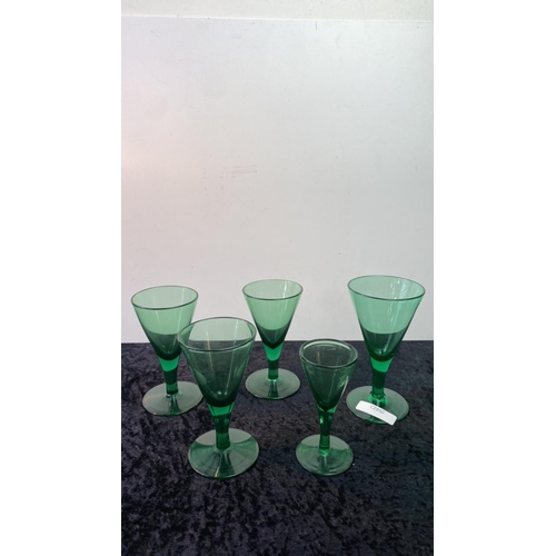 176 - Fabulous collection of hand blown green glasses , possibly Bristol, 34 in total