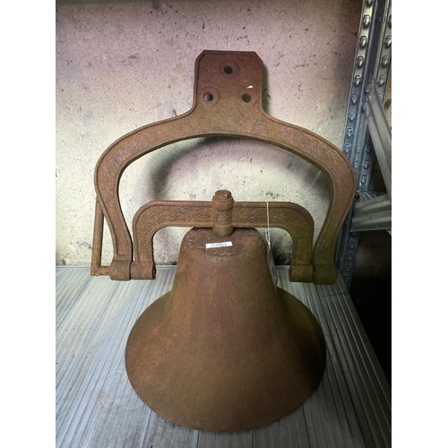 28 - Large bell with clanger with impressive hanging bracket - bell approx 24cm tall (excluding bracket)