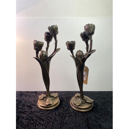 31 - Pair of resin candlesticks - approx 34cm tall