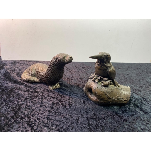 33 - Two resin figurines of an otter and a kingfisher