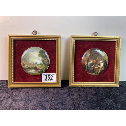 352 - Two gilt framed pot lids