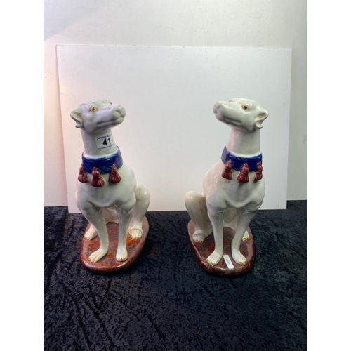 41 - Fabulous pair of continental pottery greyhounds with tasselled collars - approx 35cm tall