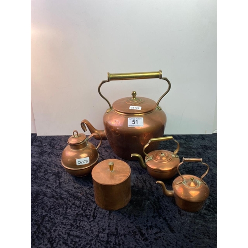 51 - Brass handled copper kettle along with a selection of small copper items