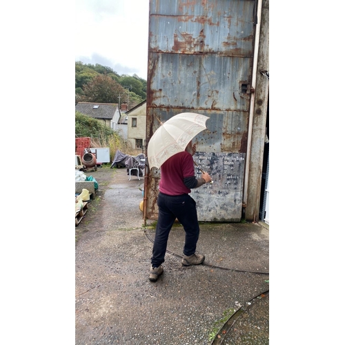 77 - Beautiful vintage parasol (Daryl not included)