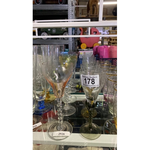 178 - 6 coloured glasses with twisted stems - one A/F along with 6 glass tumblers with etched design, colo... 