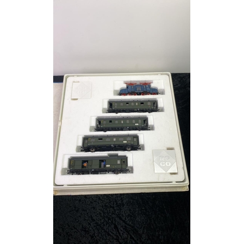 216 - A boxed Roco railway/tram carriage set