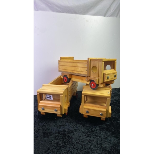 243 - Three wooden model toy trucks