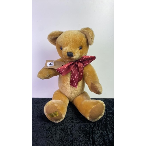 44 - Merrythought teddy bear with Ironbridge design ribbon (no tag), approx 49cm ear to paw