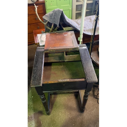 677 - A lovely antique wooden school desk with hinged lid and original inkwell. Lockable with key. Approx ... 