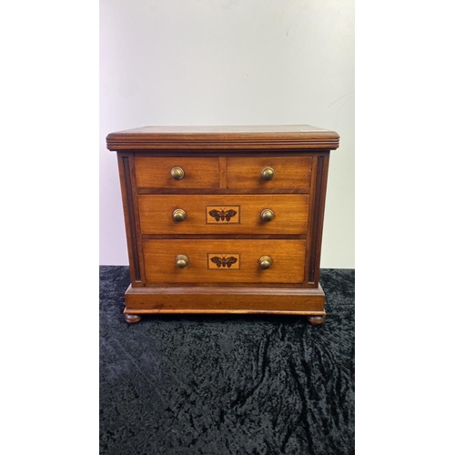 68 - Magnificent apprentice piece chest of drawers with Tunbridge ware style butterfly detail and lined d... 