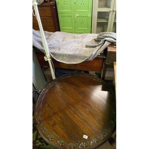 682 - A large circular coffee table, solid hardwood construction, with decorative scallop edging. Approx H... 