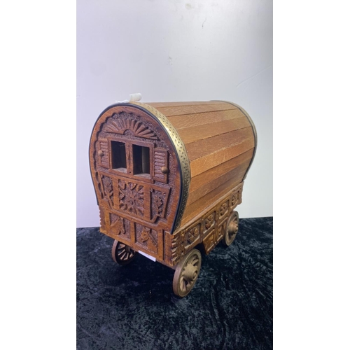 89 - Carved wooden gypsy caravan, approx 31cm tall