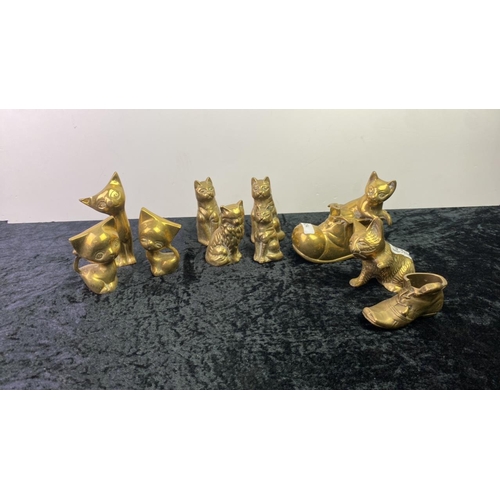 100 - Collection of brass cat ornaments