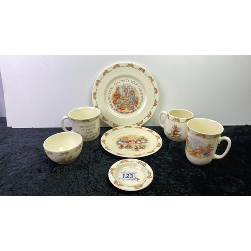 123 - A selection of Royal Doulton Bunnykins items including plates, mugs and a bowl