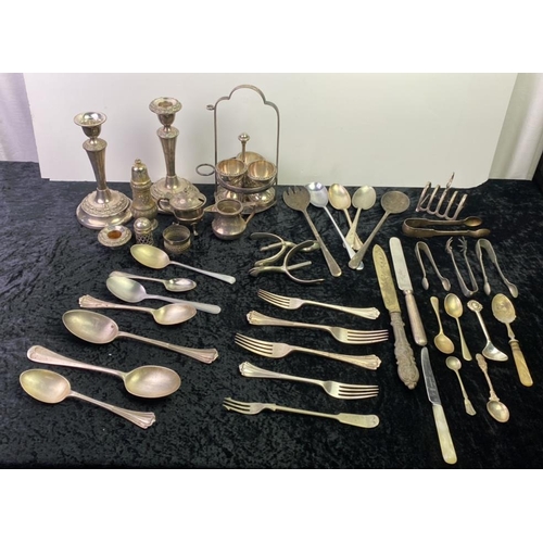 167 - A good selection of silver plate including candlesticks, cruets, jugs, cutlery - a very good mixed l... 