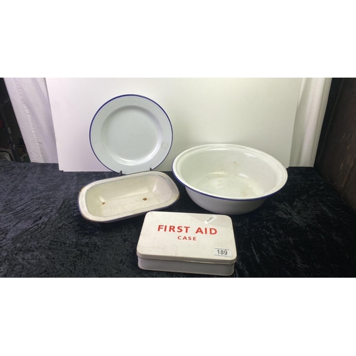 189 - An enamel bowl, dish and plate along with a vintage first aid tin with contents