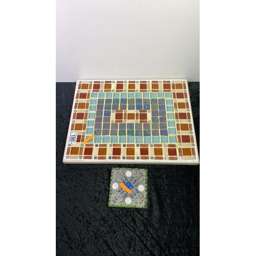 190 - A large hand made mosaic tile - 39cm x 30cm, along with a smaller tile with glass bead detail