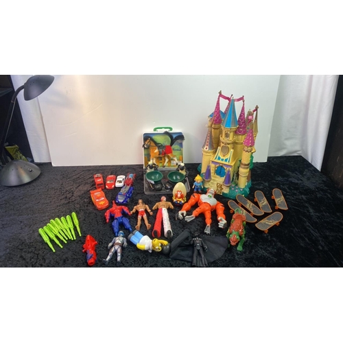 201 - A selection of toys including a fairy tale castle, action figures, Aardman Wallace and Gromit, Shaun... 