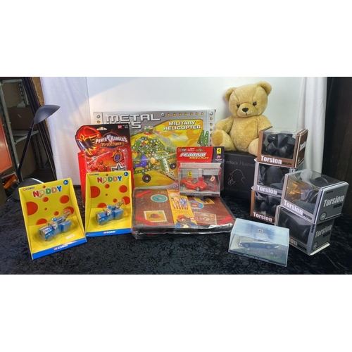 221 - A selection of brand new toys, including a helicopter, metal assembly kit, Paddington activity set, ... 