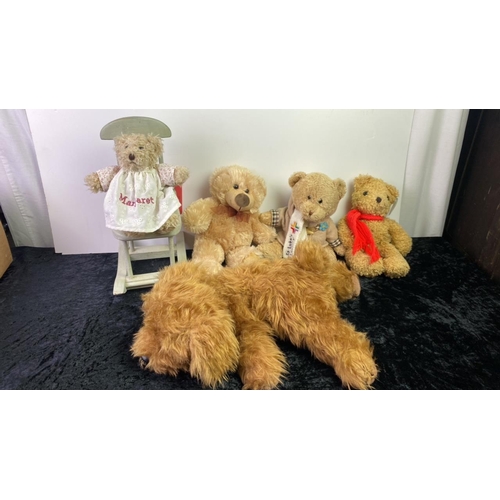 231 - A box of teddy bears and a lovely floppy dog