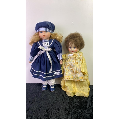 235 - Two dolls with china heads - quite creepy…………