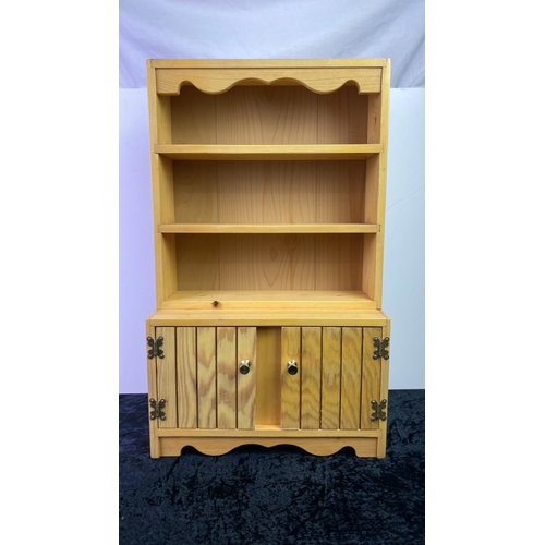 242 - Wooden toy Welsh dresser and doll’s crib (needs boots)