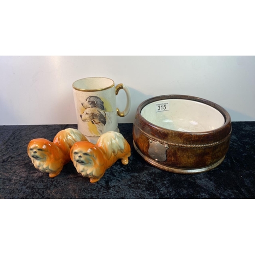 315 - Very posh dog bowl in wooden barrel style holder, dog tankard and pair of Shihtzu dog figurines