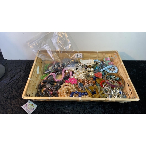 319 - Basket of costume jewellery inc. necklaces, beads, bracelets, earrings etc