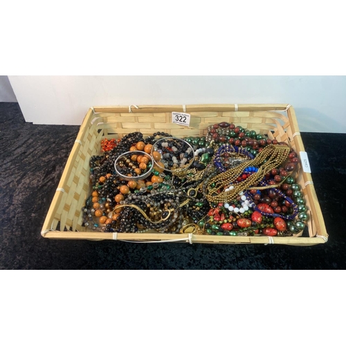 322 - Basket of costume jewellery inc. necklaces, beads, bracelets etc