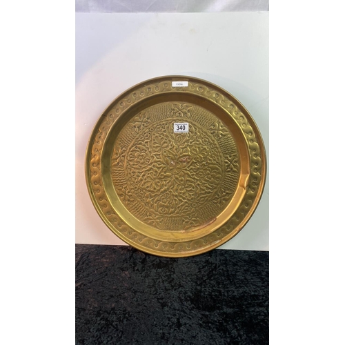 340 - Brass tray with hammered geometrical design, approx 45cm diameter