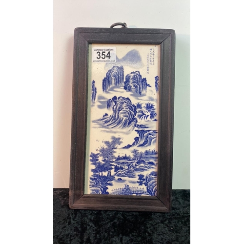 354 - Chinese blue and white ceramic tile, signed with country scenes, 11inches