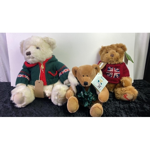 38 - Three Harrods teddy bears - large 2000 bear (no tag), medium bear with Union Jack jumper (with tag) ... 