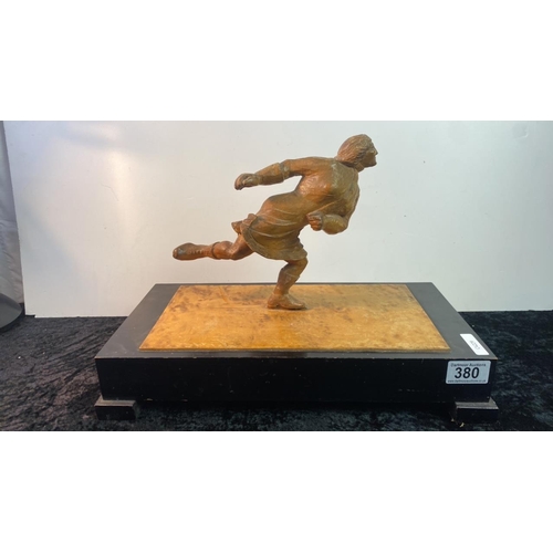 380 - Unusual carved wooden figurine of an ice skater on wooden plinth, approx 28cm tall (inc. plinth)