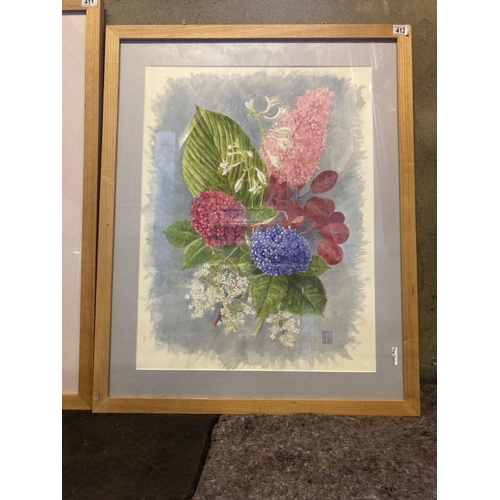 412 - A large framed watercolour depicting garden flowers - complements previous lot - measures approx 92c... 