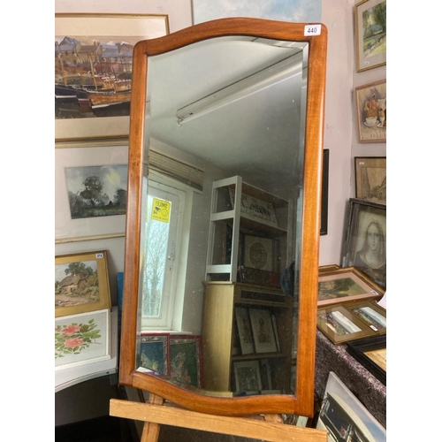 440 - Wooden framed beveled edged mirror. Measures approx 106cm x 54cm