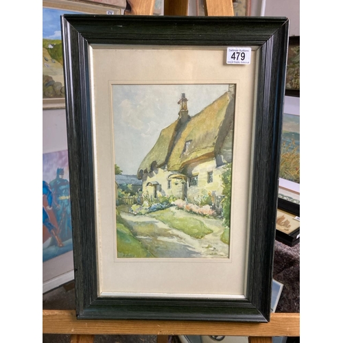 479 - A framed print of a cottage scene by A Marc. Approx 52cm x 36cm