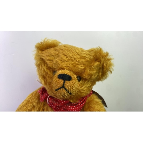 51 - Grisly mustard colour teddy bear, approx 30cm ear to paw