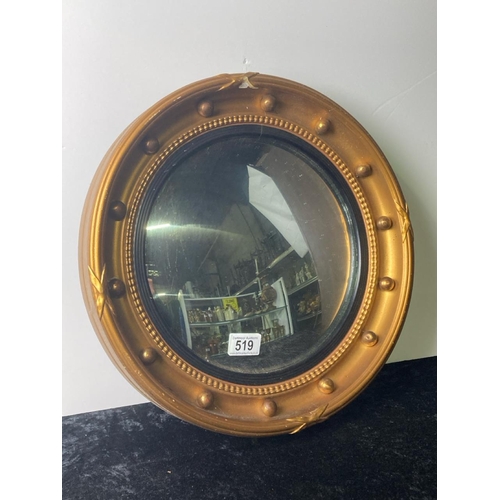 519 - Circular concave mirror chipped to the frame. 41cm diameter