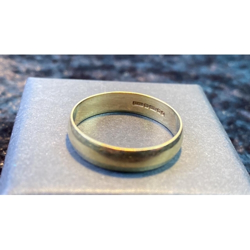 560 - A 9 carat gold Gent’s wedding band. 19 mm diameter. 2.6g