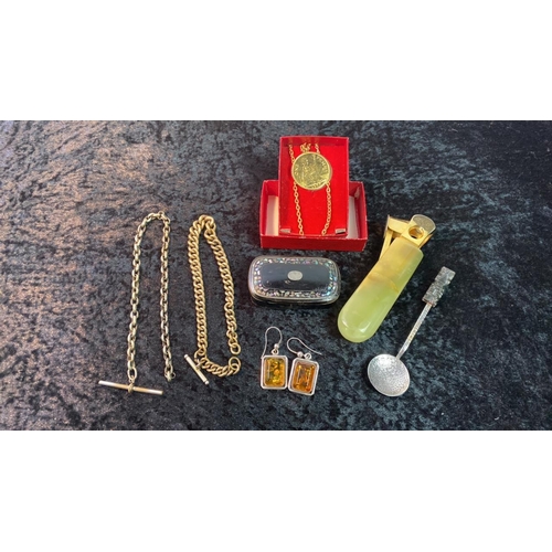 574 - A bag of mixed collectibles including a lacquer trinket box, amber earrings, Mexican white metal spo... 